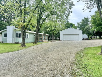 Lake Home For Sale in Wheatland, Missouri