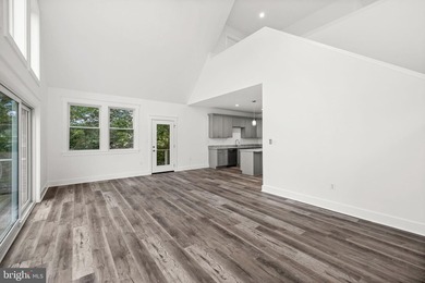 Enjoy elevated lakefront living in this brand-new - photo 12