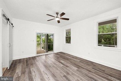 Enjoy elevated lakefront living in this brand-new - photo 19