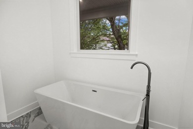 Enjoy elevated lakefront living in this brand-new - photo 23