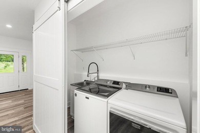 Enjoy elevated lakefront living in this brand-new - photo 27