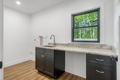 Discover a standout lakeside retreat and investment opportunity - photo 21