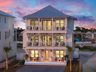 Set within the exclusive coastal enclave of Hadley's Beach, a - photo 1