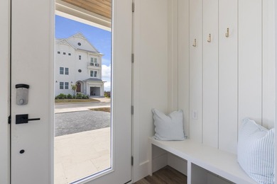 Set within the exclusive coastal enclave of Hadley's Beach, a - photo 5