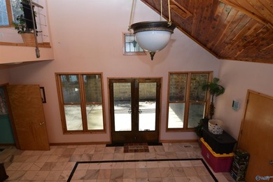 Located on the main channel of Lake Guntersville, this stunning - photo 21