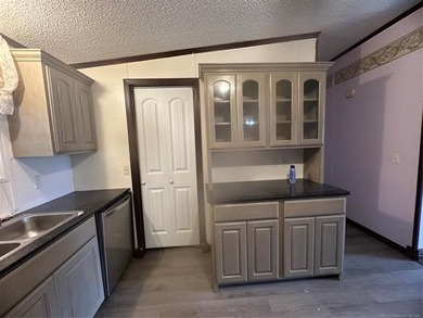 LARGE DOUBLE-WIDE HOME ON NEARLY HALF AN ACRE AND LESS THAN A - photo 21