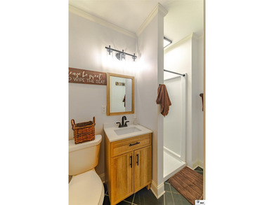 Welcome to this charming 3-bedroom, 2-bath home nestled in the - photo 22