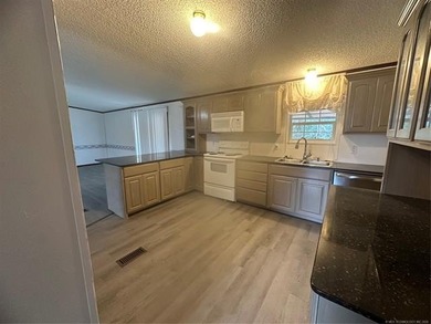 LARGE DOUBLE-WIDE HOME ON NEARLY HALF AN ACRE AND LESS THAN A - photo 22