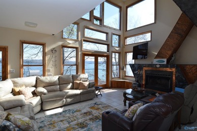 Located on the main channel of Lake Guntersville, this stunning - photo 25
