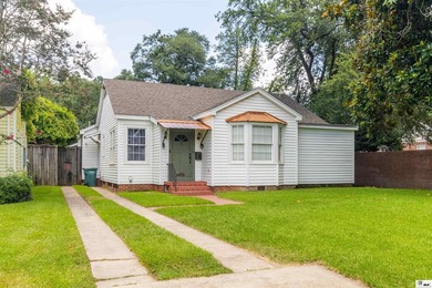 Welcome to this charming 3-bedroom, 2-bath home nestled in the - photo 29