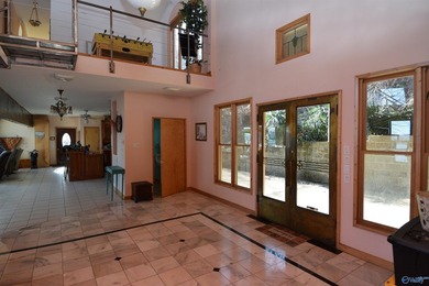 Located on the main channel of Lake Guntersville, this stunning - photo 32