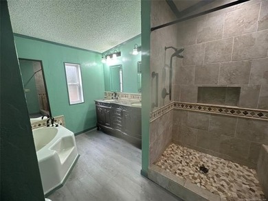 LARGE DOUBLE-WIDE HOME ON NEARLY HALF AN ACRE AND LESS THAN A - photo 34