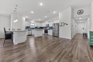 This 2020-built home in Heather's Place offers a spacious and - photo 4