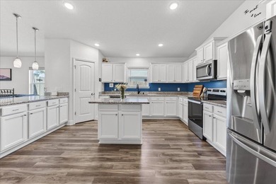 This 2020-built home in Heather's Place offers a spacious and - photo 5