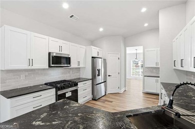 STOP THE CAR - This one is Stunning ~ Better than new, this home