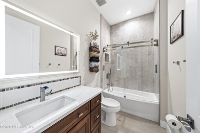 Built in 2023, this exceptional all-brick estate is tucked - photo 14