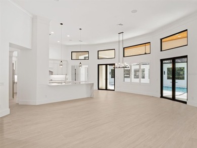 Set within the gates of renowned Isleworth, this beautifully - photo 11
