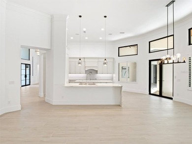Set within the gates of renowned Isleworth, this beautifully - photo 13