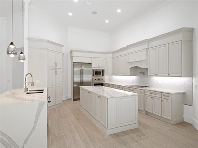 Set within the gates of renowned Isleworth, this beautifully - photo 15