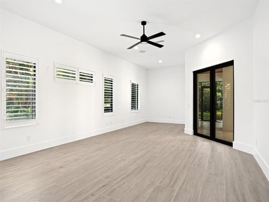 Set within the gates of renowned Isleworth, this beautifully - photo 19
