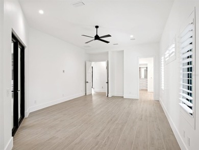 Set within the gates of renowned Isleworth, this beautifully - photo 20