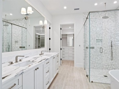 Set within the gates of renowned Isleworth, this beautifully - photo 22