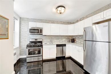 Welcome to refined urban living in this bright, true one-bedroom