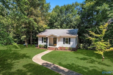 Lake Home For Sale in Rogersville, Alabama