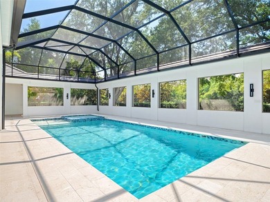 Set within the gates of renowned Isleworth, this beautifully - photo 39