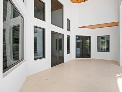 Set within the gates of renowned Isleworth, this beautifully - photo 41
