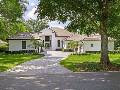 Set within the gates of renowned Isleworth, this beautifully - photo 43