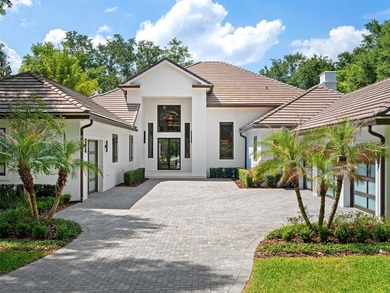 Set within the gates of renowned Isleworth, this beautifully - photo 44