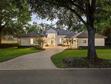 Set within the gates of renowned Isleworth, this beautifully - photo 48