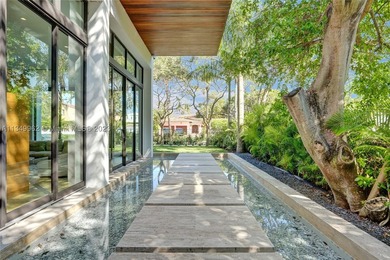 JUST COMPLETED! NEW CONSTRUCTION!!Experience modern beach living - photo 11