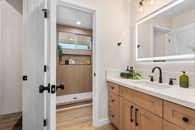 Discover modern island living in this brand new 3 bedroom, 2 - photo 12