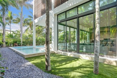JUST COMPLETED! NEW CONSTRUCTION!!Experience modern beach living - photo 12