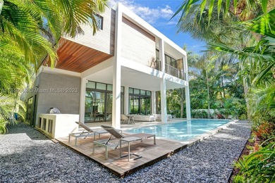 JUST COMPLETED! NEW CONSTRUCTION!!Experience modern beach living - photo 14