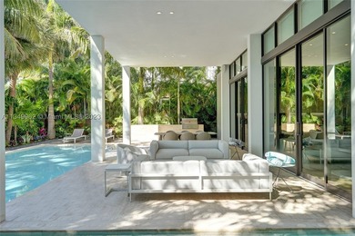 JUST COMPLETED! NEW CONSTRUCTION!!Experience modern beach living - photo 16