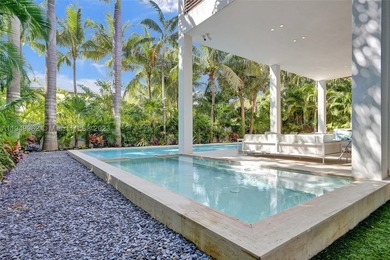 JUST COMPLETED! NEW CONSTRUCTION!!Experience modern beach living - photo 17