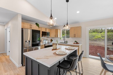 Discover modern island living in this brand new 3 bedroom, 2 - photo 21