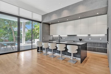 JUST COMPLETED! NEW CONSTRUCTION!!Experience modern beach living - photo 34