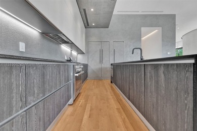 JUST COMPLETED! NEW CONSTRUCTION!!Experience modern beach living - photo 37