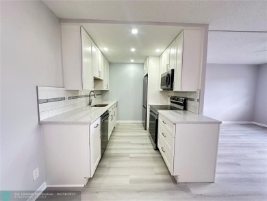 Lake Condo For Sale in Deerfield Beach, Florida
