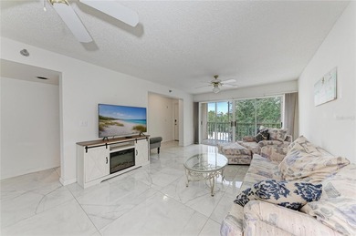 Welcome to this spacious 2-bedroom, 2-bath end-unit condo in the - photo 8