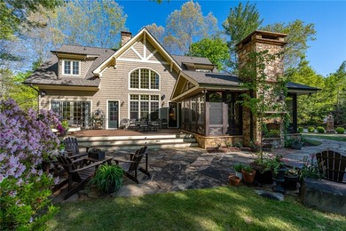 This Adirondack-inspired home is gracefully set atop a wooded - photo 2