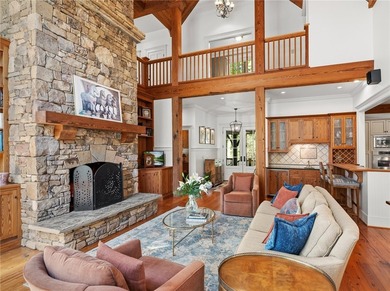 This Adirondack-inspired home is gracefully set atop a wooded - photo 7
