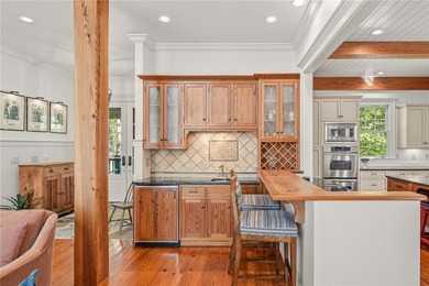 This Adirondack-inspired home is gracefully set atop a wooded - photo 8