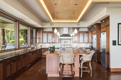Set on nearly 8 acres of pasture in a gated Kula setting, this - photo 17