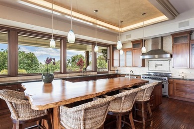 Set on nearly 8 acres of pasture in a gated Kula setting, this - photo 18