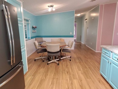 THIS HOME IS ON LEASED LAND WITH A MONTHLY LOT RENT OF $620 AND - photo 41